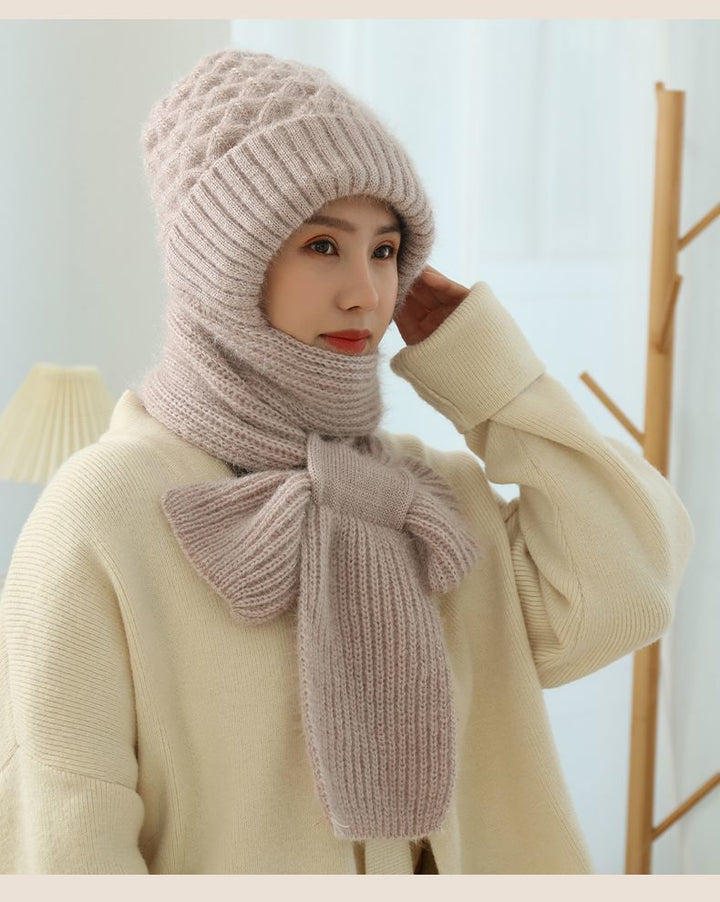 Woman wearing a knit hood with scarf