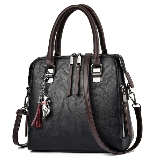 Vintage faux leather purse with tassel