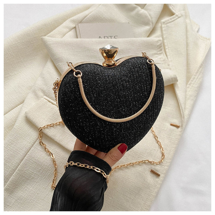 Heart-shaped metallic clutch with chain