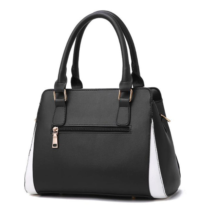 Two-tone handbag with pompom charm