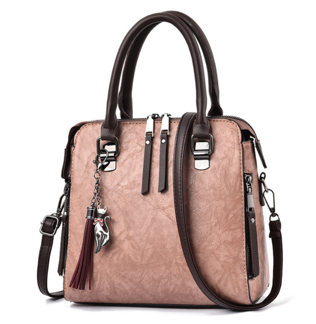 Vintage faux leather purse with tassel