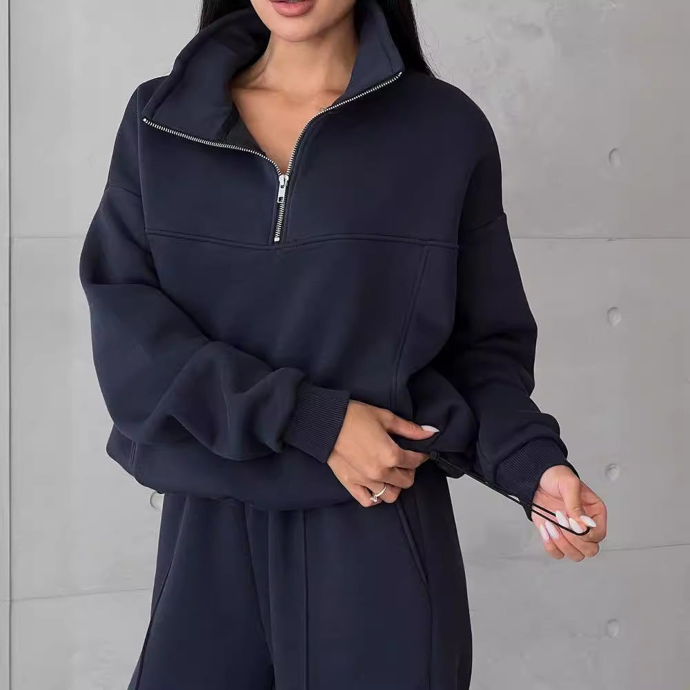 Woman in a half-zip fleece tracksuit